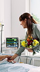 Woman, holding hands and patient in hospital with bouquet, support and wish for speedy recovery. Smile, adult daughter or senior mother in medical ward with flowers, get well soon and surgery success