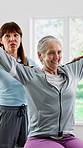 Physio, exercise and old woman in clinic with smile, mobility support and rehabilitation for wellness. Happy, senior person and assistance in office for physical therapy, arm workout and fitness.