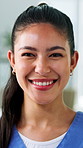 Happy, woman and face of nurse in hospital with confidence for career in medical service. Smile, about us and portrait of healthcare worker with pride for nursing advice, support or job in clinic.