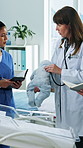 Doctor, nurses and baby doll for stethoscope, training and teamwork or research in clinic. Healthcare group, people or pediatrician mentor with child model for internship, collaboration or discussion