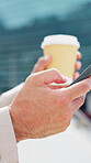 Hands, phone and coffee in city for scroll, online payment and connection to network. Business man, takeaway and technology for communication, mobile user and internet for message by urban buildings