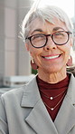 Face, smile and confident woman in city for business, about us and financial advisor with pride. Arms crossed, portrait and mature person outdoor with experience, investment professional and wind