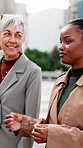 Talk, team or business women in city on walk, real estate or development advice with mentor. Collaboration, people or planning outdoor with feedback, property discussion or morning commute with flare