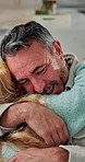 Love, father and hug with kid in home for security, bonding together and connection on weekend. Happy family, care and girl embrace parent in lounge for support, talking and laughing with daughter