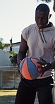 Basketball court, training and men with ball, fitness and practice for skill development with coach. Outdoor, athlete and black person with personal trainer, exercise and technique for sport match