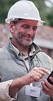 Construction, phone and mature man at site for building report, safety compliance and remodeling. Architecture, supervisor and person on cellphone for infrastructure, property development or internet