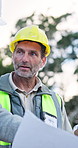 Blueprint, man and planning with team at construction site for engineering, development or layout. Architecture, paperwork and talking with mature person for building design, feedback and outdoor