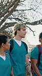 Medical student, friends and walk with people on campus for learning, doctor residency and college. Healthcare internship, opportunity and medicine program with group in university for conversation