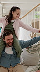Dad, carry and daughter on shoulder in home for playful weekend, bonding or flying together. Happy father, child or kid playing with mom or parent on sofa for holiday, vacation or childhood in house