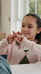 Child, parents and learning with hands in home for sign language, education or development. Kid, girl or teaching with symbol or motion gesture for silent communication, lesson or help in house