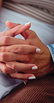 Love, relax and couple holding hands in home for marriage connection, bonding together and trust. Security, people and romance in house with affection, commitment and loyalty in healthy relationship