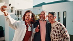 Selfie, senior and parents with adult woman in home for photography, picture or memory together. Elderly mom, dad or female person with smile or thumbs up for capture moment or family gathering