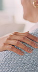 Hand, woman and shoulder for support, empathy and understanding with compassion in therapy. Comfort, touch and person with kindness for care, trust or consoling with help for mental health counseling