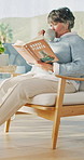 Coffee, reading book and woman in living room in home for hobby, relax and literature for learning. Happy, mature person and drink with novel, guide or education for horticulture tutorial in lounge