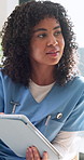 Nurse, patient and discussion in clinic with tablet, online research and medical report for diagnosis. Healthcare worker, woman and conversation in hospital with consultation, tech or recommendation.