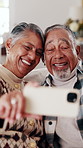 Old couple, people and selfie on sofa with smile for bonding, love and memories in home. Senior woman, elderly man and happy in living room on couch for profile picture, relax and retirement together