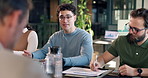 Meeting, documents and business people in office with teamwork on finance growth at startup. Graphs, discussion and group of financial advisors with paperwork for revenue report with research plan.