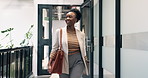 Creative, business or black woman walking in office building for work arrival or start in workplace. Female person, employee or commute with smile in entrance for punctuality or time management