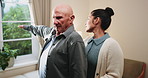 Elderly, man and stretching in clinic with physiotherapist, wellness and support for injury recovery. Senior person, arm exercise and healthcare worker talk with advice, rehabilitation or assistance.
