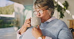 Coffee, thinking and old woman in wheelchair in home for relax, wellness and morning beverage. Retirement, drink and person with disability at house, reflection or remember past with window view