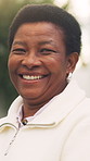 Happy, outdoor and face of black woman in backyard with confidence, wellness and relax on weekend. Smile, home and portrait of mature person with positive attitude, calm or peaceful morning at house.