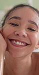 Happy, face and woman in bath for cleaning, hygiene and self care for calm, relax and wellness. Home, portrait and person in bathroom with steam, water and smile for pamper, wellbeing and grooming