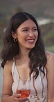 Woman, laugh and date outdoor with wine glass, funny conversation and flirting on weekend break. Happy, female person and discussion with alcohol drink for valentines day, humor and romantic outing.