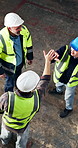 Construction, happy and men on site with high five, team victory and motivation in building project. Above, ppe and engineers with collaboration, encouragement and success in industrial development.