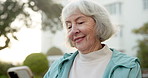 Text, smile and old woman outdoor with phone, online communication and post reaction on social media. Digital, happy and senior person with laugh, message update and chatting on virtual platform.