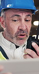 Man, engineer and tablet in factory with radio, planning or update in work instructions. Mature project manager, tech or reading in workshop for efficient production, communication or report feedback