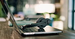 Empty, help desk and laptop with headset at call center, communication and contact us. Customer service, advice or hotline workspace with computer, audio technology and client support for telecom