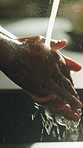 Washing, hands and man with water, rinse and faucet for hygiene, wellness and germ protection. Home, sink and person with liquid, soap and cleaning for disinfection, bacteria prevention and health