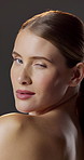 Face, laugh and woman with pride for skincare, studio background or hydration with cosmetic benefits. Portrait, wink and happy person with healthy skin, beauty and confident with dermatology in USA