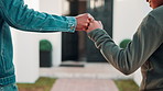 Fist bump, outdoor and father with child at new home for celebration of family property investment. Secret handshake, bonding and dad with boy kid for connection together in backyard at house.