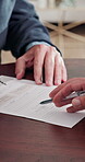 Documents, hands and signature of old person in home for insurance or investment sign up. Advice, finance and senior man with security broker in apartment for contract, policy or wealth management