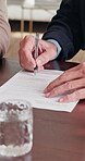 Finance, hands and signature of old person in home for insurance or investment sign up. Advice, documents and senior man with security broker in apartment for contract, policy or wealth management