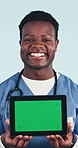 Healthcare, face and man with tablet, green screen and promotion for telehealth and nurse in studio. Blue background, medical professional and black person with technology, happy and mockup space