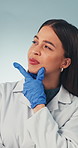Thinking, woman and doctor in studio with ideas, problem solving and healthcare solution. Medical insight, planning and brainstorming with decision, inspiration or reflection on white background