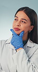 Thinking, woman and doctor in studio with problem solving, ideas and healthcare solution. Medical insight, planning and brainstorming with eureka, inspiration or reflection on white background