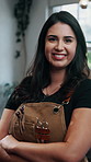 Barbershop, face and happy woman with confidence for beauty styling or grooming service in salon. Portrait, female person or stylist with smile, pride or arms crossed for haircare or cut in parlor