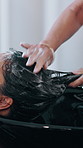 Hands, shampoo and washing with customer at hairdresser for change, cleaning or hair maintenance. Basin, hygiene and water with women in hairdressing workplace for haircare process or treatment