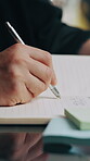 Agenda, hands and writing with person in office for small business management or planning. Notebook, pen and schedule with employee at desk in startup workplace for calendar, checklist or to do list