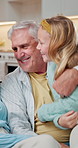 Love, grandparents and kid in house with tickle, childcare and bonding together on weekend break. Laugh, talking and family with humor, playful moment and happy connection in healthy relationship.