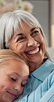 Smile, grandmother and child at house with hug, love and parental care for bonding together. Happy, senior woman and embrace in home with kid, affection and family connection for babysitting weekend