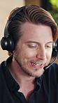 Headset, help and man in call center for customer care, banking assistance or loan inquiry. Hotline, consultant and male person with financial service, talking or contact us for account feedback