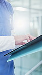 Nurse, hands and planning in hospital with folder, health insurance paperwork or patient records. Flare, man and healthcare worker in clinic with medical aid application, documents or administration.