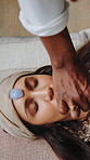 Meditation, stone and woman with healer, peace or chakra balance for aura restoration. Crystal, relax or person with holistic alignment ritual, hand and alternative medicine at wellness center above
