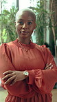 Face, business and black woman in workplace with plants for eco friendly project, about us and career. Green office, portrait and person for environmental consultant, sustainability and crossed arms