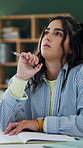 Thinking, task or university student in house with pen, study session or problem solving in coursework. Revision, thoughts or woman with assignment, exam insight or brainstorming on college thesis.