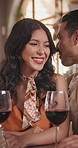 Whisper, love and couple in restaurant date for flirting, rumor or funny gossip with happy partner. Romantic dinner, man and woman with secret, talking and laugh at confidential joke with wine